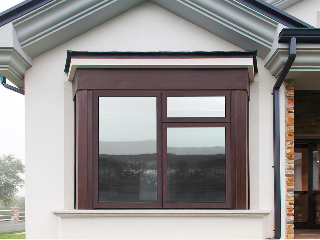 close up exterior shot of brown casement window